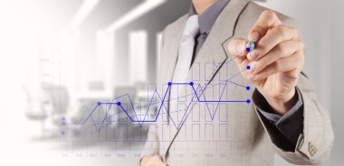 işadamı el iş başarı grafik çizer.