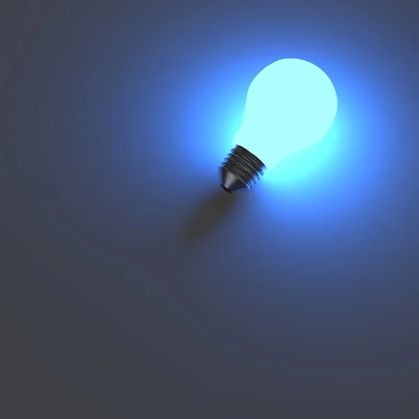 Ampoule sur fond bleu — Photo