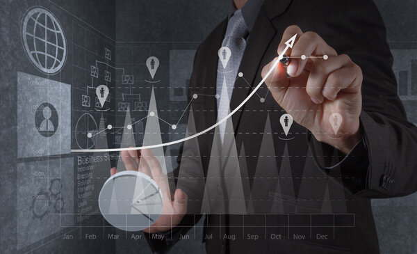 businessman hand working with new modern computer and business s