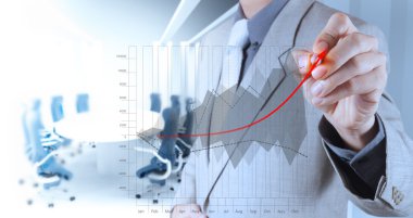 işadamı el iş başarı grafik çizer.