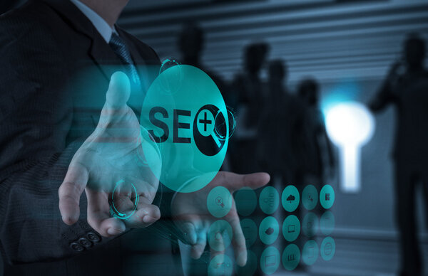 businessman hand showing search engine optimization SEO