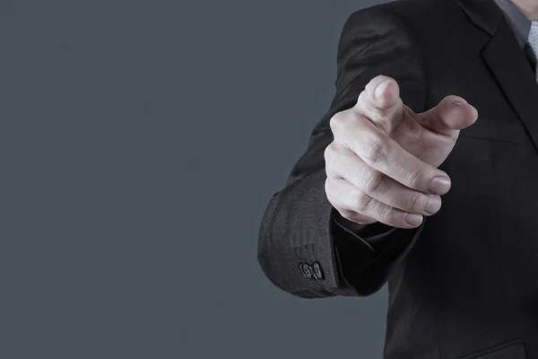 Businessman hand pressing an imaginary button on virtual screen — Stock Photo, Image