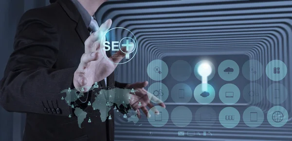 Businessman hand showing search engine optimization SEO — Stock Photo, Image