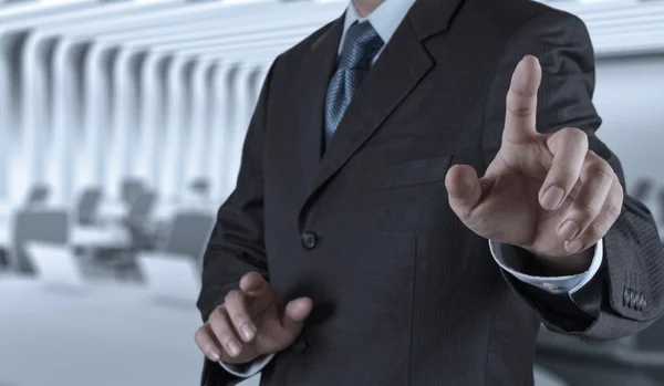 Businessman hand pressing an imaginary button — Stock Photo, Image