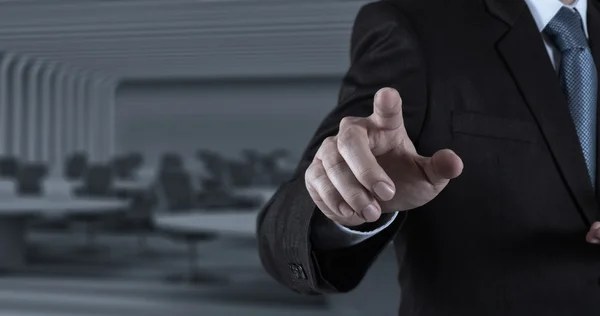 Businessman hand pressing an imaginary button — Stock Photo, Image