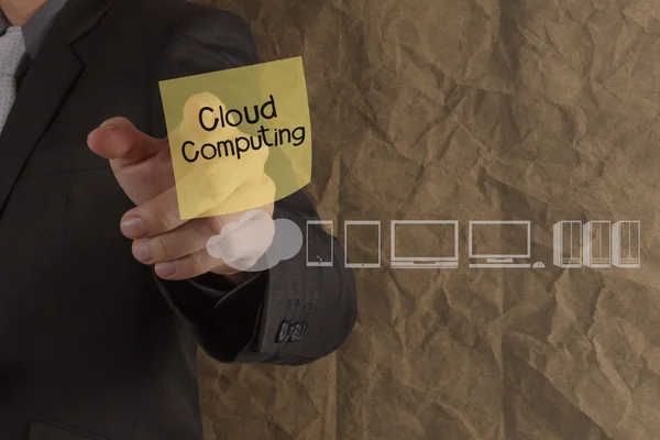 Uomo d'affari punto mano cloud computing sulla nota appiccicosa con le icone — Foto Stock