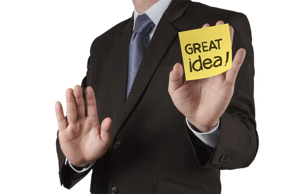 Affärsman hand Visa bra idé ord på fästis med vit — Stockfoto