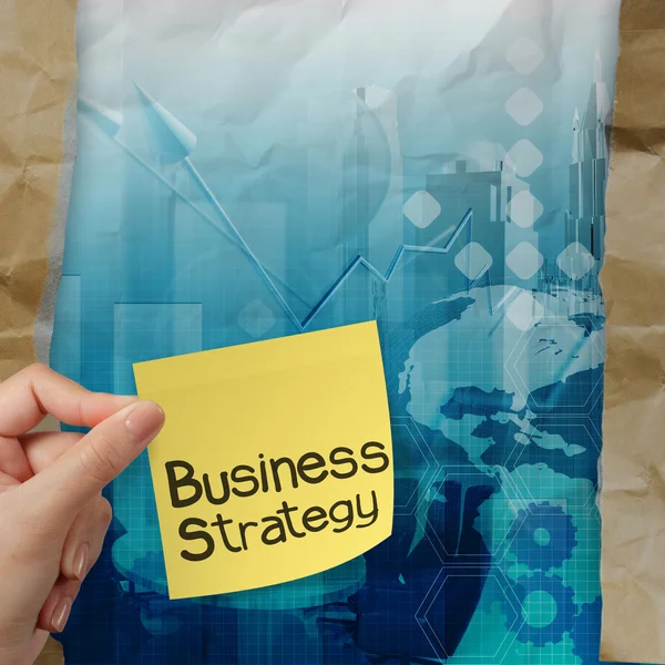 Business Strategy Hintergrund auf zerknittertem Papier mit Tränenhülle — Stockfoto