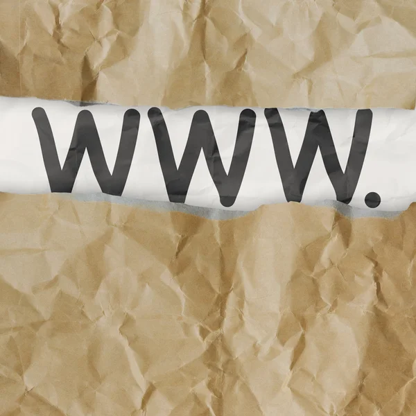 手は、インターネット概念として www しわくちゃの紙の背景に描かれた. — ストック写真
