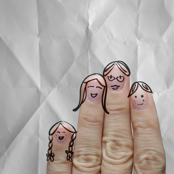 Familia de dedos feliz sobre fondo de papel arrugado — Foto de Stock