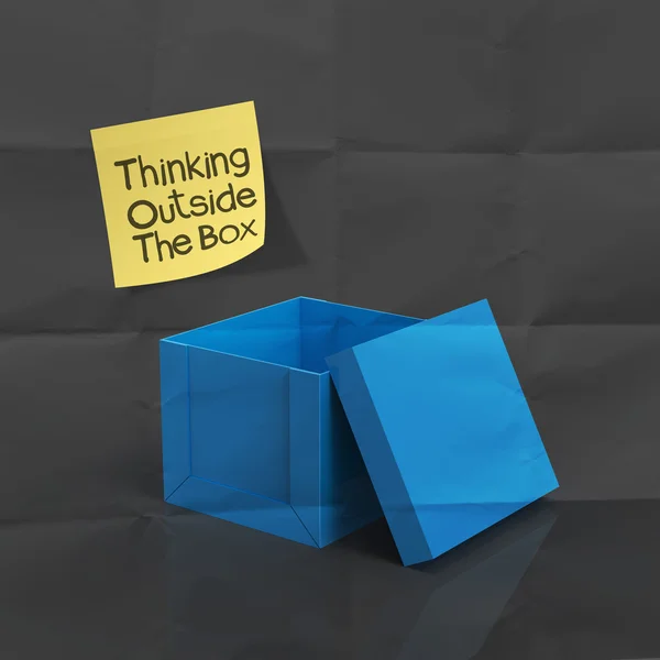 Sticky note with thinking outside the box on dark crumpled paper — Stock Photo, Image