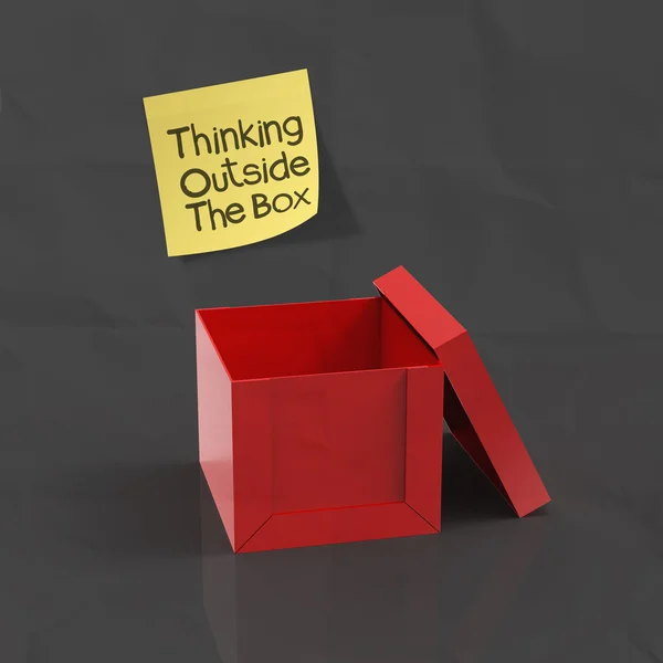 Sticky note with thinking outside the box on dark crumpled paper — Stock Photo, Image