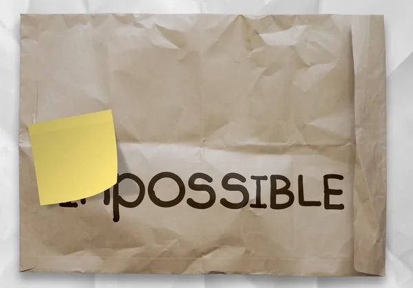 Sticky note over word impossible transformed into possible as co — Stock Photo, Image