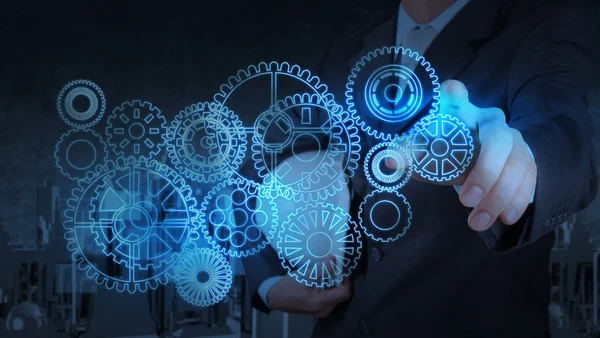 Hombre de negocios trabajando con equipo de luz azul para el éxito — Foto de Stock