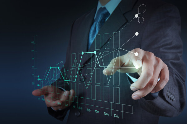 businessman hand working with new modern computer and business s