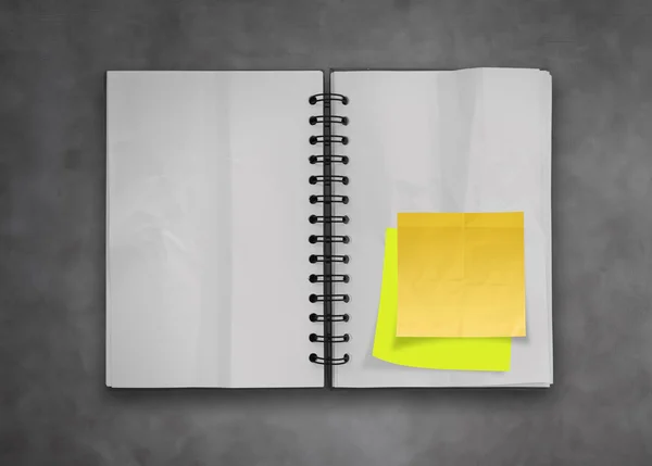 Sticky notes with open blank note book on deak top texture — Stock Photo, Image