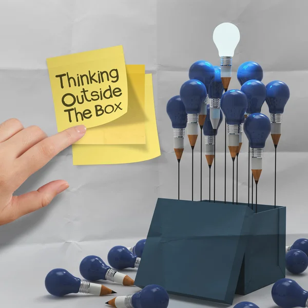 Thinking outside the box on sticky note and pencil lightbilb — Stock Photo, Image