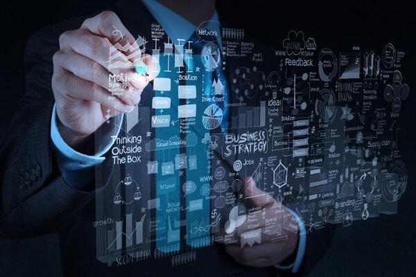 business man hand working with new modern computer and business s
