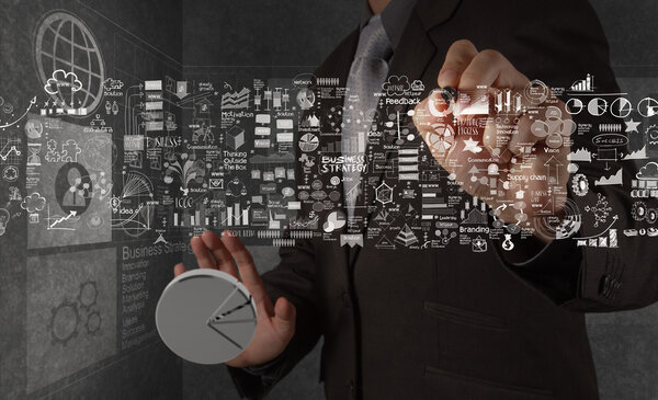 businessman hand working with new modern computer and business s