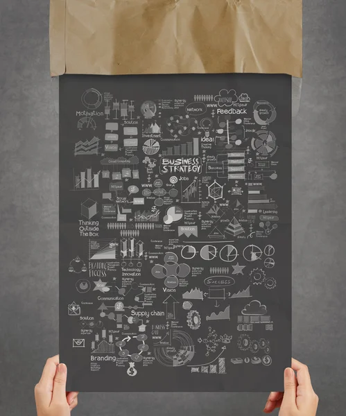 Hand met business strategie op donker papier achtergrond poster een — Stockfoto
