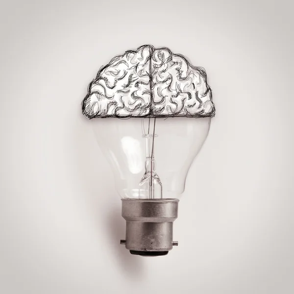 Light bulb with hand drawn brain as creative idea concept — Stock Photo, Image