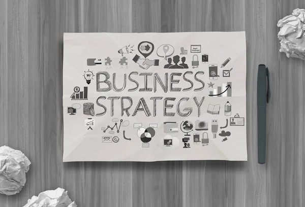 Estrategia empresarial dibujada a mano sobre el fondo de papel arrugado como con — Foto de Stock