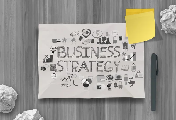 Estratégia empresarial desenhada à mão sobre papel de fundo amassado como con — Fotografia de Stock