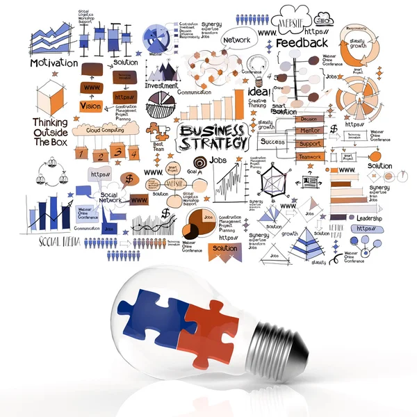 Puzzles in light bulb and business strategy as concept — Stock Photo, Image