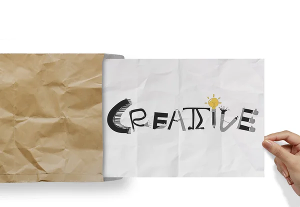 D pull crumpled paper from envelope with design word CREATIV — стоковое фото