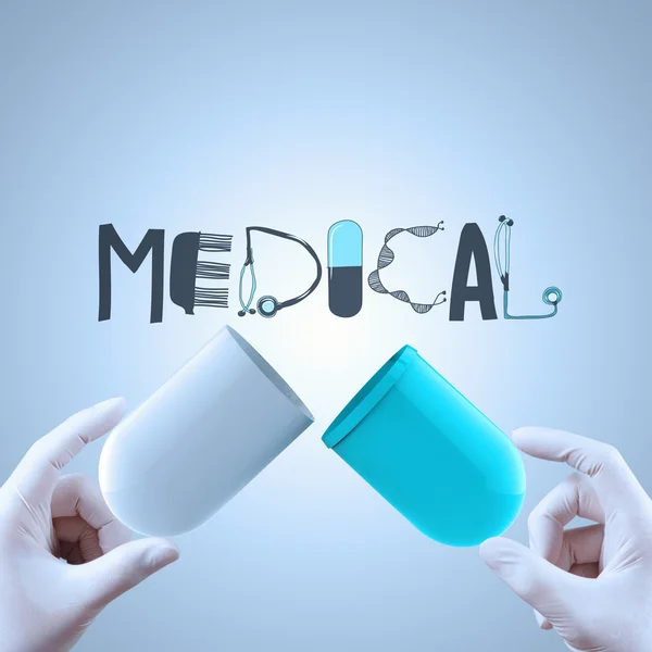 Hands open capsule show graphic design word MEDICAL asl concept — Stock Photo, Image