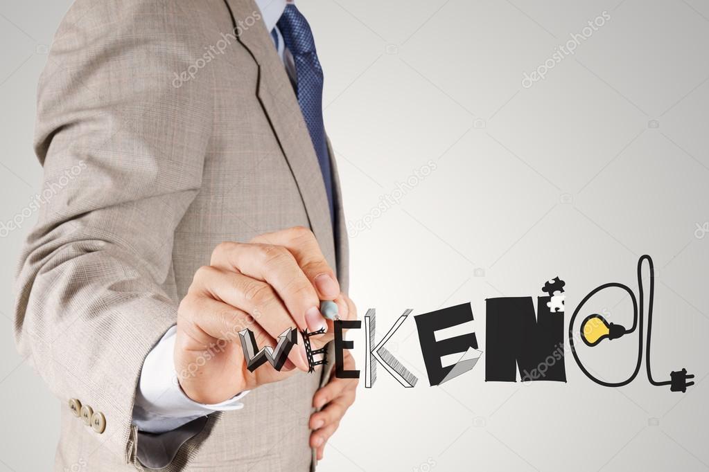 businessman hand drawing design graphic word WEEKEND as concept