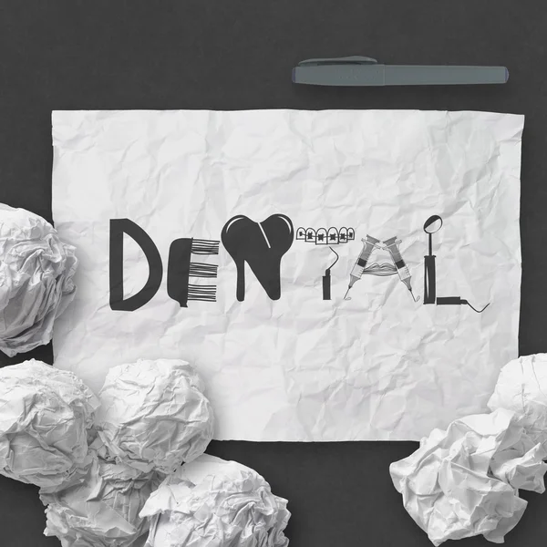 Design word DENTAL on white crumpled paper and texture backgroun — Stock Photo, Image