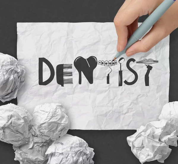 Tasarım kelime dişçi üzerinde beyaz buruşuk kağıt ve doku backgro — Stok fotoğraf