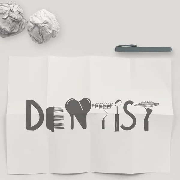 Palabra de diseño DENTIST sobre fondo blanco arrugado de papel y textura — Foto de Stock