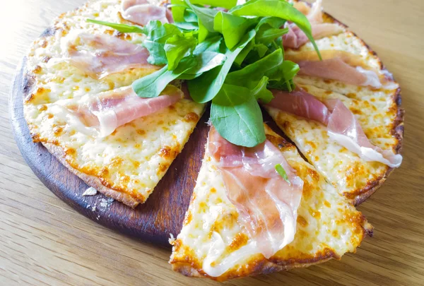 Itallian pizza parma ham on wood dish — Stock Photo, Image