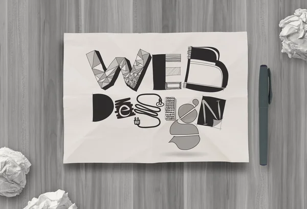 Hand dras web design diagram på skrynkligt papper bakgrund som co — Stockfoto