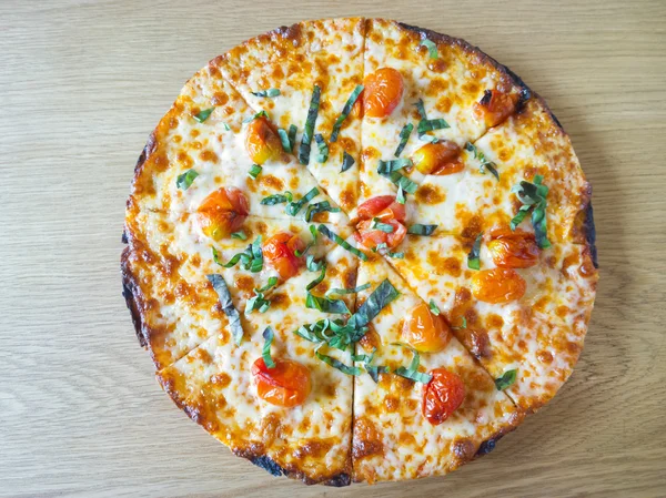 Delicious italian pizza on wood table — Stock Photo, Image