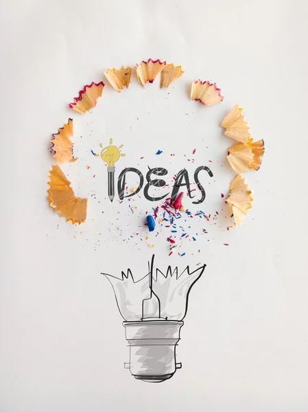 Conception de mot ampoule dessinée à la main IDEA avec de la poussière de scie à crayon sur p — Photo