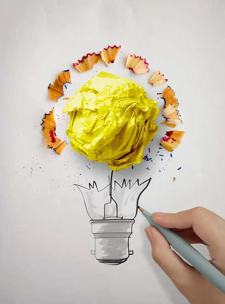 Hand drawing  light bulb and crumpled paper with pencil saw dust — Stock Photo, Image