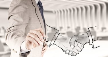 hand drawn handshake sign as partnership business concept clipart