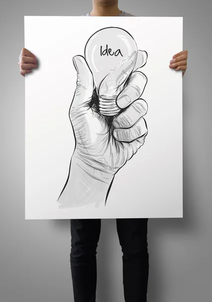 Man showing poster of Hand drawn light bulb with IDEA word on cr — Stock Photo, Image