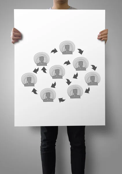 Man showing poster of Hand drawn social network structure as con — Stock Photo, Image