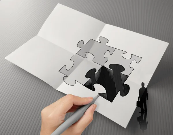 Hand drawing Partnership Puzzle and businessman icon on crumpled — Stock Photo, Image