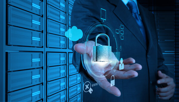 businessman hand pointing to padlock on touch screen computer as