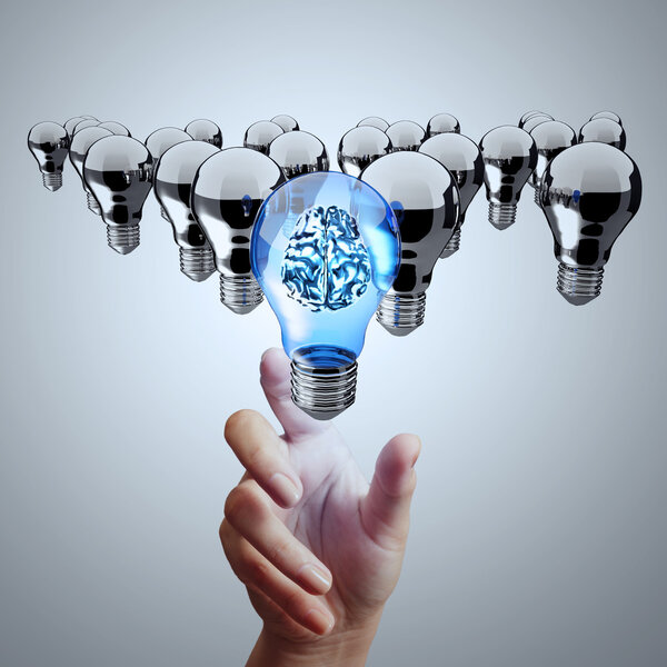 hand reach 3d metal brain inside  light bulb of leadership conce
