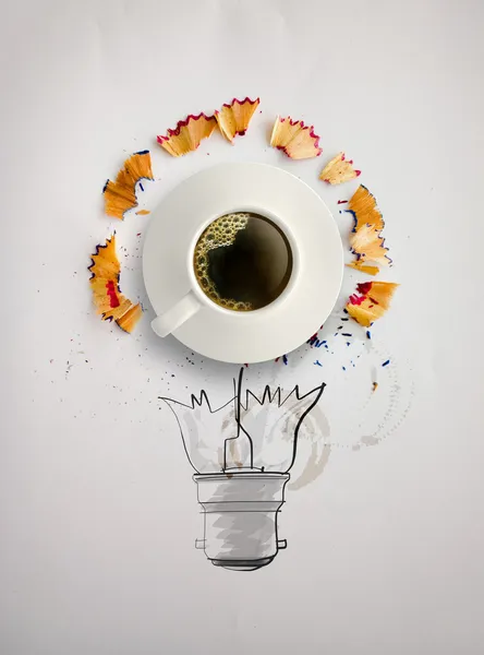 Hand drawn light bulb with pencil saw dust and 3d cup of coffee — Stock Photo, Image