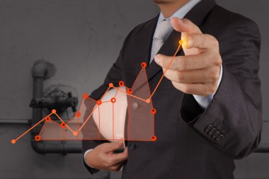 işadamı el iş başarı grafik çizer.