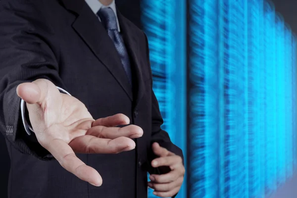 Businessman hand and server room background as concept — Stock Photo, Image