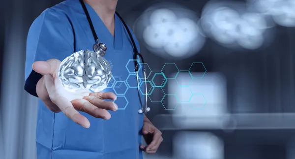 Medical  doctor with brain3d meatl in his hands as concept — Stock Photo, Image