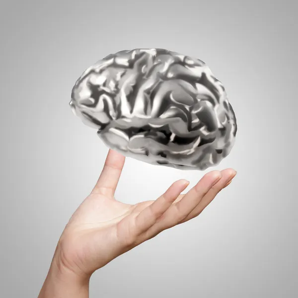 Empresario mano mostrando 3d metal cerebro humano como concepto — Foto de Stock